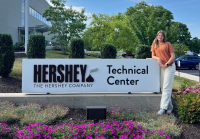 Liv Huselton in front of The Hershey Company