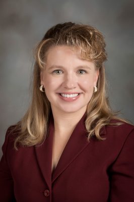 Professional photo of Dr. Shelly Rhoads.