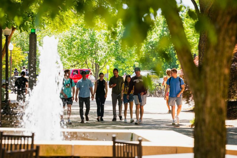 Torgersen Bridge Students walk on campus