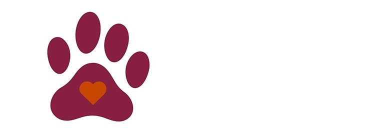 Maroon stylized dog paw prin with a small orange heard in the paw pad.