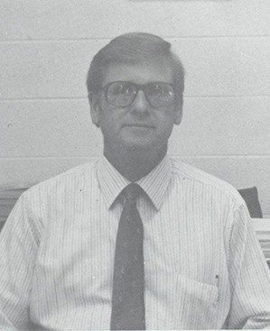 Dr. John M. White